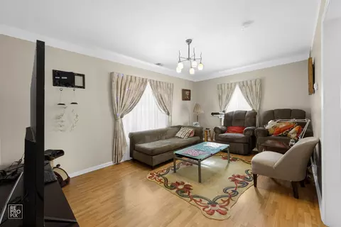 Living - 50 E 155th St, Harvey, IL 60426 photo 2 of 3