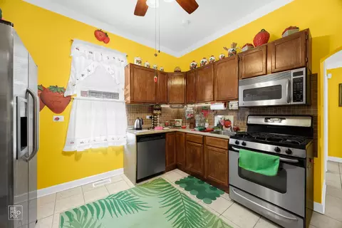 Kitchen - 50 E 155th St, Harvey, IL 60426 photo 1 of 2