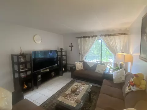 Living - 5600 Astor Ln #201, Rolling Meadows, IL 60008 photo 2 of 3