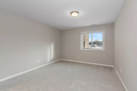 Bedroom - 1484 Stonebridge Cir #B4, Wheaton, IL 60187 photo 2 of 2