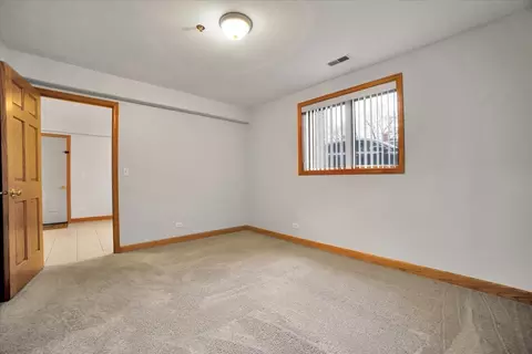 Bedroom - 32 E Hattendorf Ave #1B, Roselle, IL 60172 photo 2 of 6