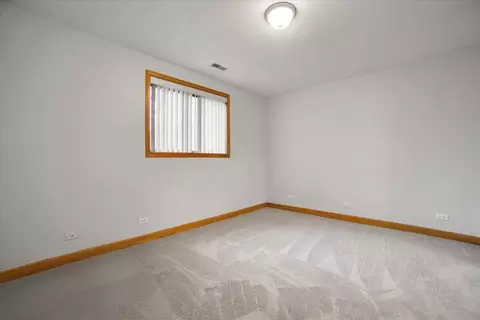 Bedroom - 32 E Hattendorf Ave #1B, Roselle, IL 60172 photo 1 of 6