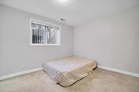 Bedroom - 32 E Hattendorf Ave #1B, Roselle, IL 60172 photo 5 of 6
