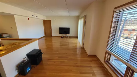 Living - 1477 Thacker Ave #310, Des Plaines, IL 60016 photo 3 of 3