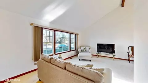 Living - 485 E Cimarron Dr, Aurora, IL 60504 photo 2 of 3