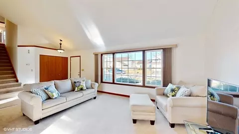 Living - 485 E Cimarron Dr, Aurora, IL 60504 photo 1 of 3