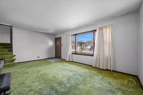 Living - 966 Sycamore Ln, Bartlett, IL 60103 photo 2 of 3