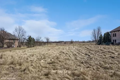 1301 Longwood Dr E, Woodstock, IL 60098