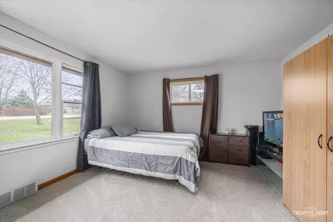 Bedroom - 15894 E Il Route 72, Davis Junction, IL 61020 photo 1 of 2