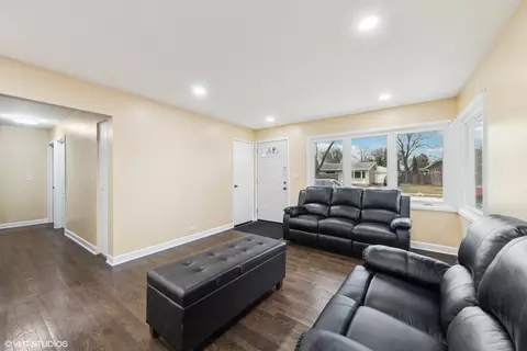 Living - 221 E Normandy Dr, Addison, IL 60101 photo 2 of 2
