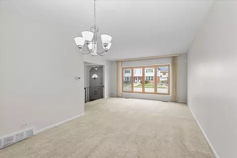 Living - 8955 Lyons St, Des Plaines, IL 60016 photo 2 of 3