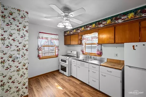 Kitchen - 805 Illinois Ave, Elgin, IL 60120 photo 1 of 2