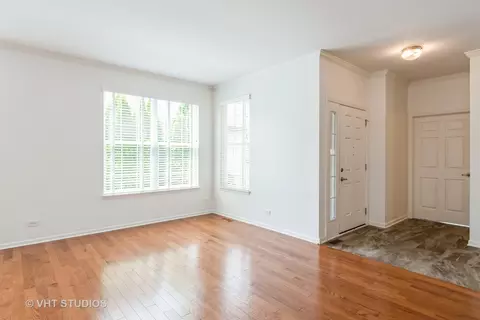 Living - 1177 Heathrow Ln, Aurora, IL 60502 photo 1 of 7