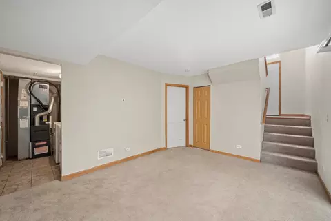 Living - 873 Symphony Dr, Aurora, IL 60504 photo 5 of 5