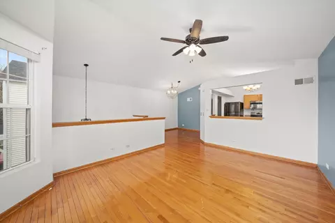Living - 873 Symphony Dr, Aurora, IL 60504 photo 3 of 5