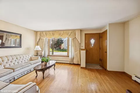 Living - 1000 Lathrop Ave, Forest Park, IL 60130 photo 2 of 3
