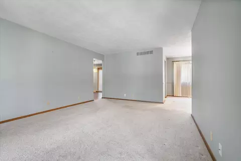 Living - 210 S Hershey Rd, Bloomington, IL 61704 photo 3 of 4