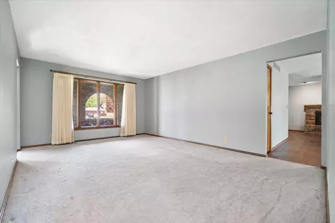 Living - 210 S Hershey Rd, Bloomington, IL 61704 photo 2 of 4