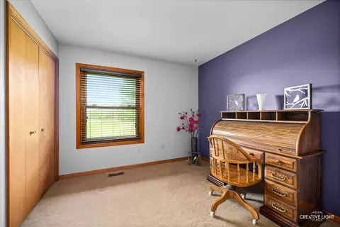 Bedroom - 911 E Main St, Plano, IL 60545 photo 2 of 4