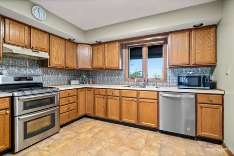 Kitchen - 911 E Main St, Plano, IL 60545 photo 2 of 2