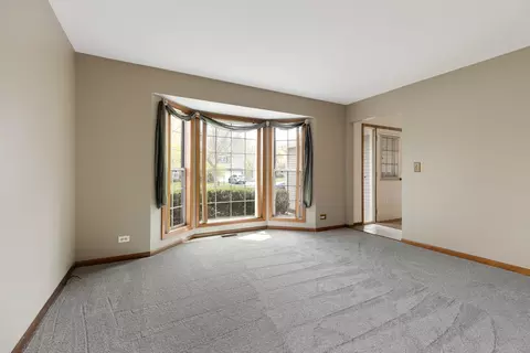 Living - 64 Ivanhoe Ln, Cary, IL 60013 photo 1 of 5