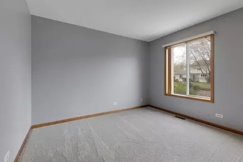 Bedroom - 64 Ivanhoe Ln, Cary, IL 60013 photo 2 of 3