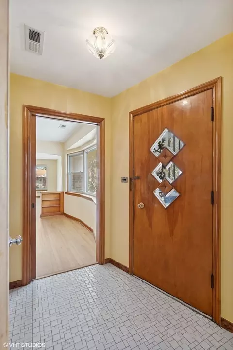 Entry Way - 7010 W Devon Ave, Chicago, IL 60631 photo 1 of 5