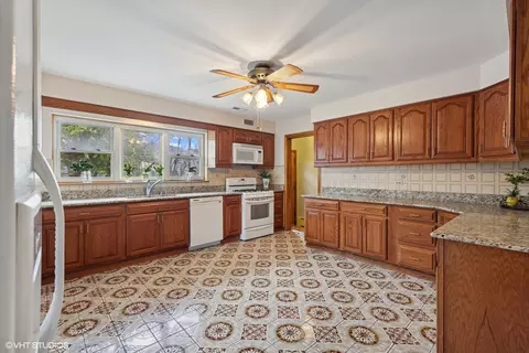 Kitchen - 7010 W Devon Ave, Chicago, IL 60631 photo 1 of 7