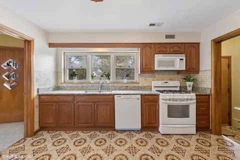 Kitchen - 7010 W Devon Ave, Chicago, IL 60631 photo 2 of 7