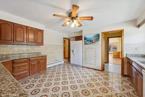 Kitchen - 7010 W Devon Ave, Chicago, IL 60631 photo 4 of 7
