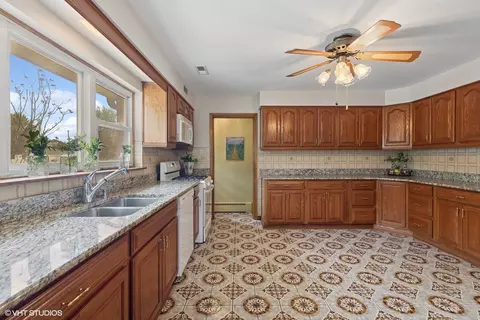 Kitchen - 7010 W Devon Ave, Chicago, IL 60631 photo 3 of 7