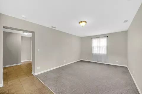 Living - 1455 Reckinger Rd, Aurora, IL 60505 photo 2 of 3