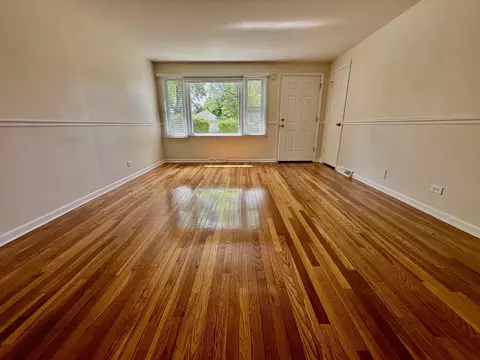Living - 319 Triggs Ave, Elgin, IL 60123 photo 1 of 5