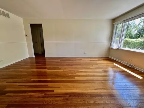 Living - 319 Triggs Ave, Elgin, IL 60123 photo 2 of 5