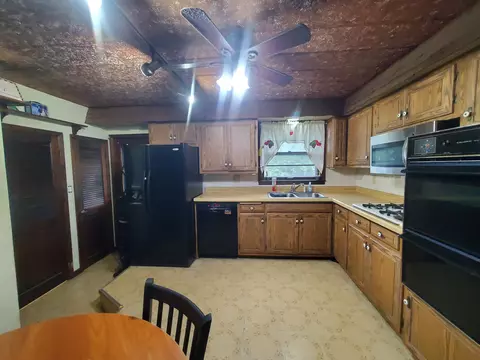 Kitchen - 3771 Emerald Ave, Steger, IL 60475 photo 2 of 2