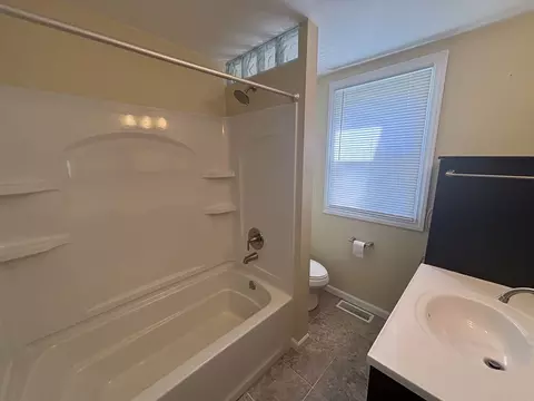 Bath - 112 W 6th St, Gridley, IL 61744 photo 3 of 4