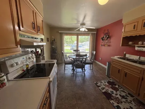 Kitchen - 180 E 34th St, Steger, IL 60475 photo 2 of 2