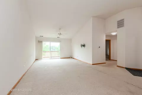 Living - 24149 W Pear Tree Cir #A, Plainfield, IL 60585 photo 1 of 2