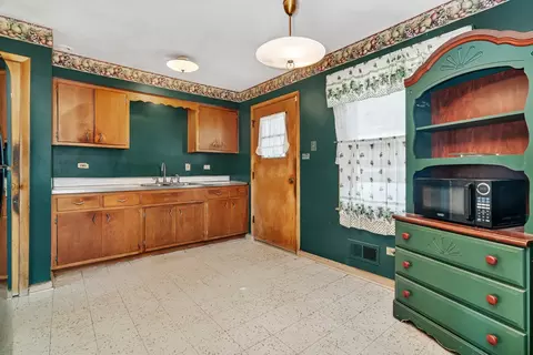Kitchen - 14700 Cooper Ave, Harvey, IL 60426 photo 1 of 3