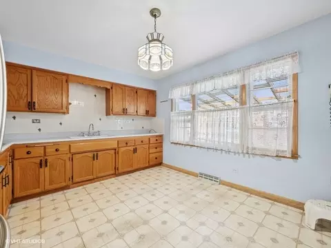 Kitchen - 7647 W Devon Ave, Chicago, IL 60631 photo 2 of 2