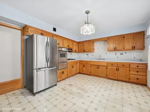 Kitchen - 7647 W Devon Ave, Chicago, IL 60631 photo 1 of 2