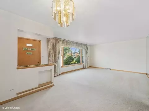 Living - 7647 W Devon Ave, Chicago, IL 60631 photo 1 of 3