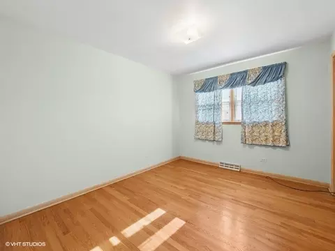 Bedroom - 7647 W Devon Ave, Chicago, IL 60631 photo 1 of 5
