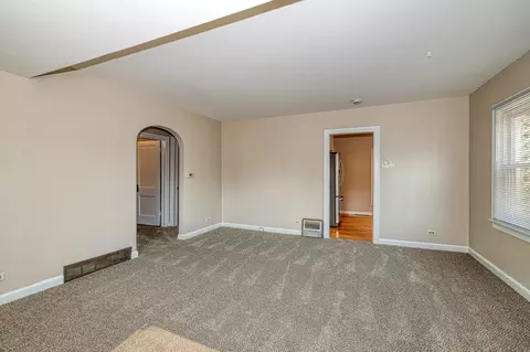 Living - 165 S Commonwealth Ave, Elgin, IL 60123 photo 1 of 2