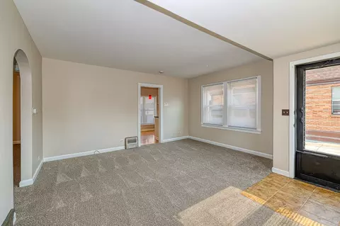 Living - 165 S Commonwealth Ave, Elgin, IL 60123 photo 2 of 2