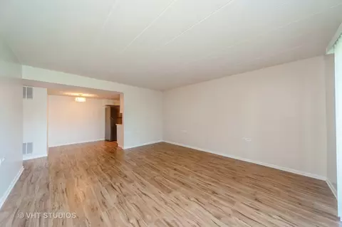 Living - 127 N Wolf Rd #52A, Wheeling, IL 60090 photo 2 of 3
