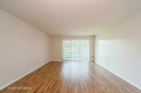 Living - 127 N Wolf Rd #52A, Wheeling, IL 60090 photo 1 of 3