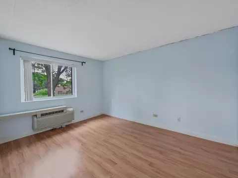 Living - 5600 Astor Ln #202, Rolling Meadows, IL 60008 photo 3 of 3