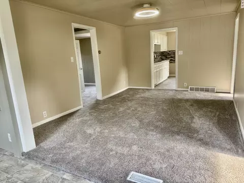 Living - 401 E 1st St, Oglesby, IL 61348 photo 2 of 3