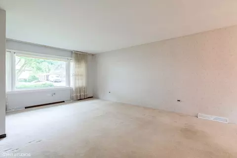 Living - 1036 Perda Ln, Des Plaines, IL 60016 photo 1 of 4